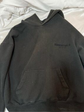 black essentials fear of god hoodie